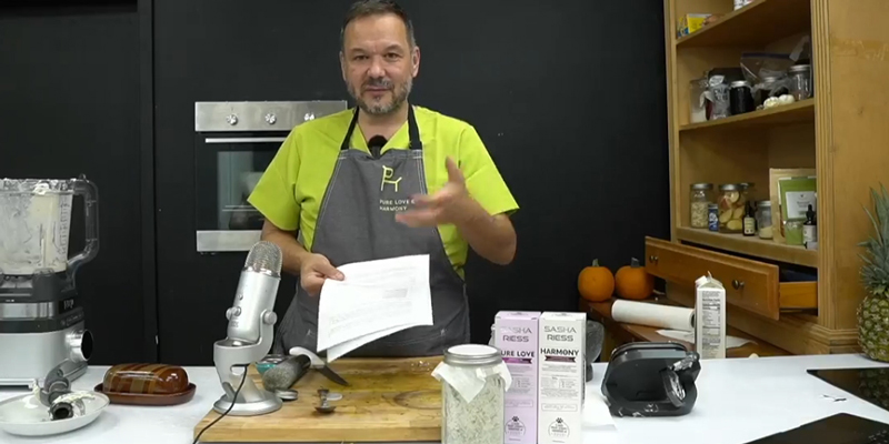 Sasha Riess preparing a natural remedy for giardia in dogs using fresh buttermilk and herbs