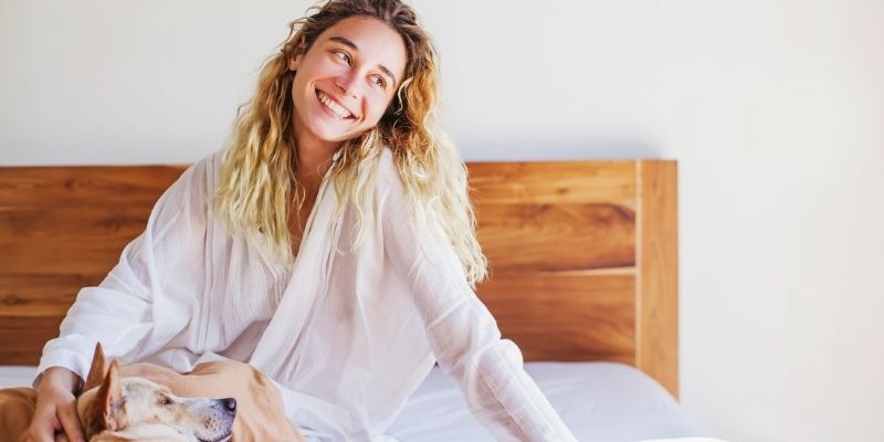 Dog and owner during the heat cycle providing calmness and routine