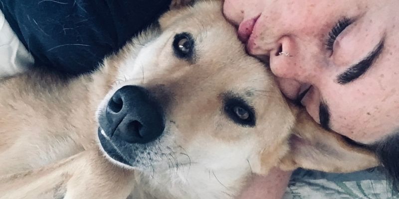 An authentic woman finding inner peace and strength through her relationship with her dog